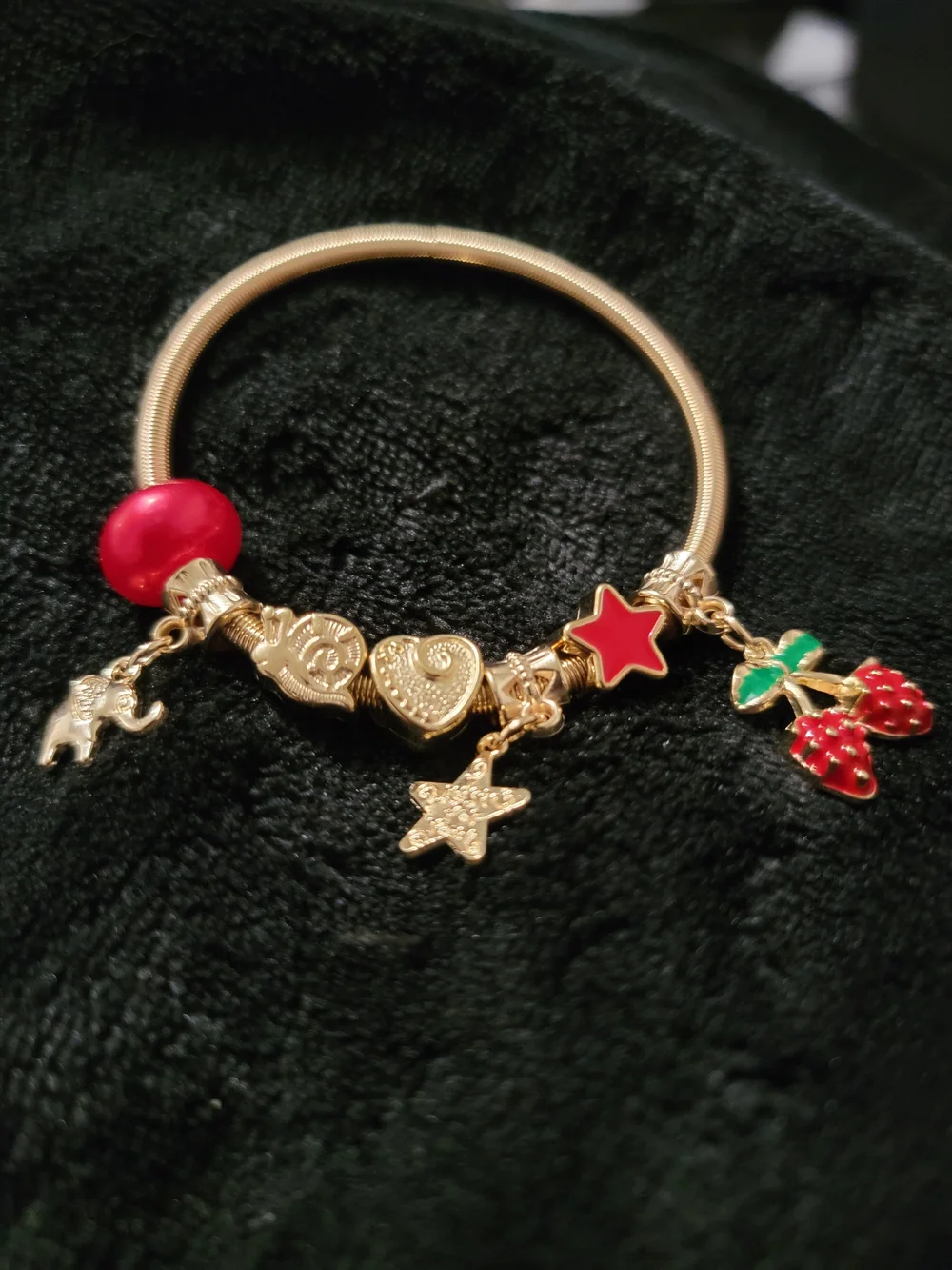 Gold Charm Bracelet with Red and Green Accents